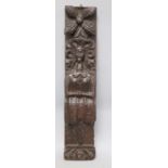 A 17th century carved oak panel, length 49cm