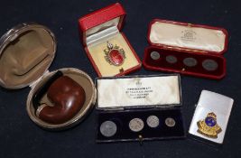 A 1901 Maundy set, cased, a 1902 part set (with1904 fourpence), cased, a 9ct gold small religious