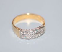 A modern 18ct gold and two row diamond half hoop ring, size J/K, gross 4.1 grams.CONDITION: Stones