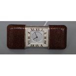 Tiffany & Co. A stainless steel and leather mounted purse alarm watch, Swiss quartz alarm