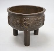 A Chinese late Ming bronze ding censer, height 15cm