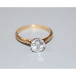 An 18ct and solitaire diamond ring, the round brilliant cut stone weighing approximately 1.10ct,