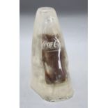 A novelty Coke bottle in 'ice', height 21cm