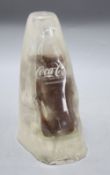 A novelty Coke bottle in 'ice', height 21cm