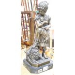 A modern bronze of a girl with a dog and puppies, height 51cm