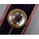 A cased Victorian yellow metal and Essex crystal 'coaching scene' stick pin, 89mm, gross 9.2 grams.
