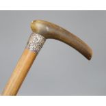 A Chinese horn and silver stick, possibly rhino horn