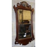 A George III style mahogany fret cut wall mirror, W.49cm, H.88cm
