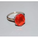 A 9ct white metal and oval cut fire opal? set dress ring, size N, gross 2.9 grams.CONDITION: Some