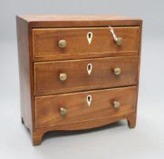 An Apprentice three drawer chest, height 23.5cm