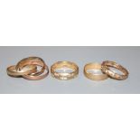 Four 9ct gold rings, including wedding band and three colour 'Russian' triple wedding band, gross