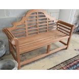 A teak Lutyens style garden bench, W.153cm, D.60cm, H.106cmCONDITION: As new condition