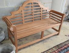 A teak Lutyens style garden bench, W.153cm, D.60cm, H.106cmCONDITION: As new condition