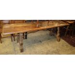 An 18th century Spanish oak centre table, W.240cm, D.60cm, H.74cmCONDITION: The top is marked,