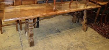 An 18th century Spanish oak centre table, W.240cm, D.60cm, H.74cmCONDITION: The top is marked,