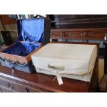 A lady's vellum dressing case and a gentleman's morocco dressing case, larger 50 x 34cm