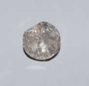 An unmounted flat? cut diamond, weighing approximately 1.52ct.CONDITION: Large chip to one of the