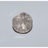 An unmounted flat? cut diamond, weighing approximately 1.52ct.CONDITION: Large chip to one of the