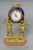 A French gilt metal and enamel cherub timepiece, height 18.5cm