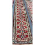 A North West Persian red ground runner, 400 x 85cm