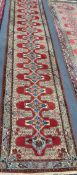 A North West Persian red ground runner, 400 x 85cm