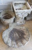 Two reconstituted stone garden planters together with a scalloped shell bird bath, bird bath W.64cm,