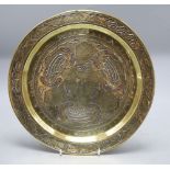 A Persian silver and copper inlaid dish, diameter 30cm