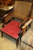 A pair of Regency style mahogany bergere armchairs (formerly from the Brighton Grand Hotel), W.63cm,