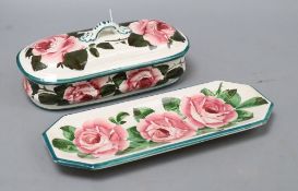 A Wemyss cabbage roses oval casket and tray, width 24cmCONDITION: The cover has restoration to one