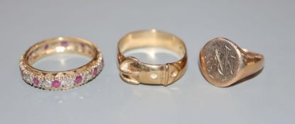 A 9ct signet ring(a.f.), a 9ct gold ruby and diamond eternity ring and a 9ct gold buckle ring, gross