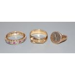 A 9ct signet ring(a.f.), a 9ct gold ruby and diamond eternity ring and a 9ct gold buckle ring, gross