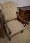 A pair of walnut tapestry Louis XIII style armchairs, W.58cm, D.60cm, H.110cm