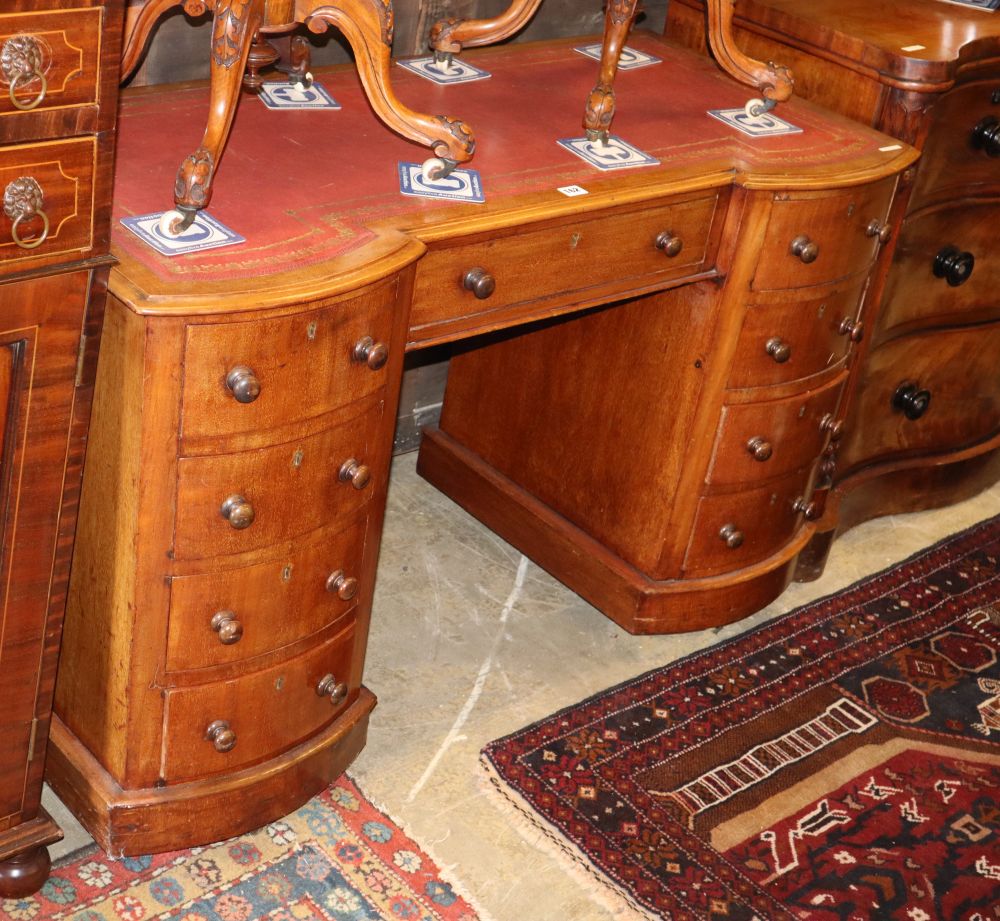 A small Victorian mahogany kneehole writing desk, W.120cm, D.55cm, H.74cm