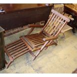 A pair of teak folding garden chairs and a teak steamer chair