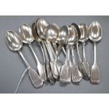 A set of nine Victorian silver fiddle pattern teaspoons, Charles Boyton, London, 1859 and a set of