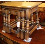 A nest of three oak tea tables, W.60cm, D.22cm, H.46cm