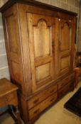 An 18th century style oak two part hanging cupboard, W.140cm, D.52cm, H.183cm