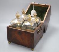 A 19th century Belgian mahogany decanter box containing three gilt decanters