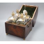 A 19th century Belgian mahogany decanter box containing three gilt decanters