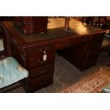 A 1920's Georgian design mahogany pedestal partners desk, W.152cm, D.107cm, H.76cm