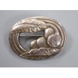 An early 1950's Georg Jensen silver leaf and berry oval brooch, design no. 18, 45mm, 11.1 grams.