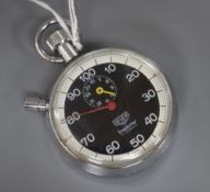 A chrome cased Heuer Trackstar stopwatch, case diameter 54mm.CONDITION: Some scratches on the back