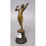 An early 20th century bronze of a nude lady, indistinctly signed, on marble base, overall height