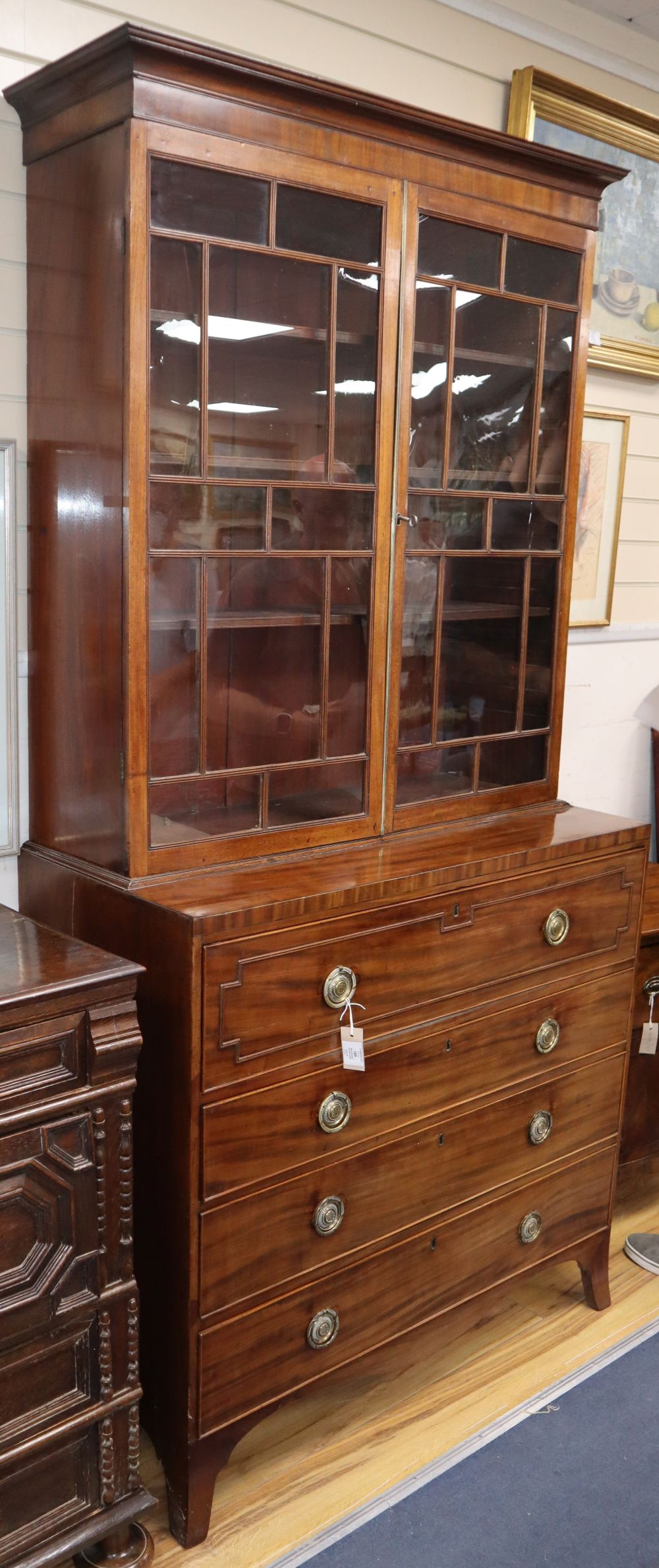 A George III and later mahogany secretaire bookcase, W.106cm, D.49cm, H.218cmCONDITION: Scratches