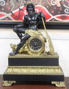 A 19th century French bronze-mounted mantel clock surmounted by the seated figure of Neptune, height