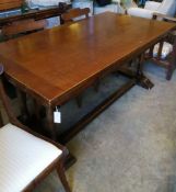 A 1920's oak draw leaf dining table, W.167cm, D.91cm, H.76cm