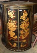 A bow fronted lacquer hanging corner cabinet, W.60cm, D.40cm, H.92cm