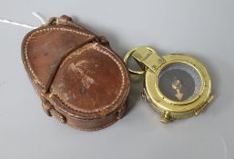 A military leather cased compass