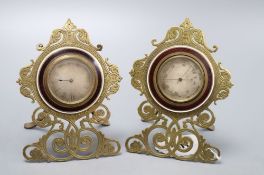 A pair of enamelled gilt metal desk pieces, barometer and timepiece, height 15cm