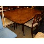 A Regency ebony inlaid mahogany tilt top dining table, W.158cm, D.100cm, H.72cm